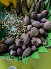 Traditional healthy snacks menu for parties in Indonesia, there are sweet corn, stewed peanuts, potatoes, bananas and breadfruit fresh from steamer.