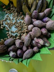 Traditional healthy snacks menu for parties in Indonesia, there are sweet corn, stewed peanuts, potatoes, bananas and breadfruit fresh from steamer.