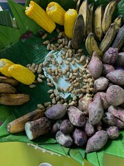 Traditional healthy snacks menu for parties in Indonesia, there are sweet corn, stewed peanuts, potatoes, bananas and breadfruit fresh from steamer.