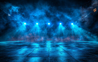 Futuristic blue neon searchlights illuminate misty stage, creating dramatic atmosphere