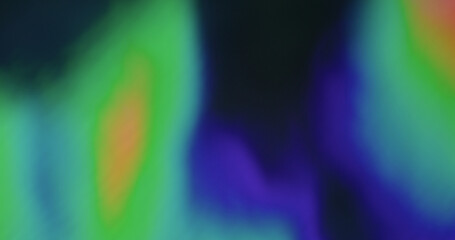 Retro hologram. Blurred light leaks. Defocused leak multicolor green yellow rays rainbow flickers...