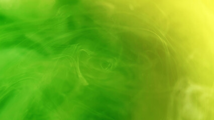 Fluid smoke. Paint water. Defocused bright green yellow cloud splash ink mist vortex flow splash...