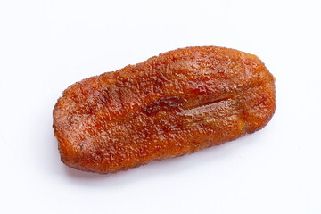 Sun dried bananas on white background.