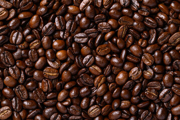 Dark roasted coffee beans background, Arabica coffee