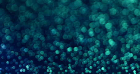 Bokeh spangle. Blue sparkling. Small light particles spots blurred hue. Fantasy atmosphere variable...