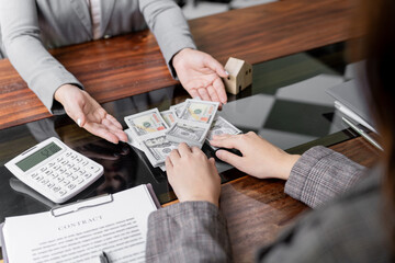 Business people signing contract making deal with real estate agent Concept for consultant home...