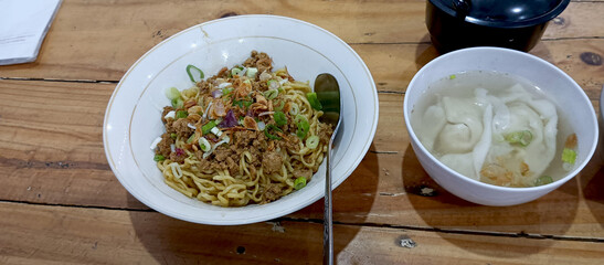 A bowl of yamin chicken noodles