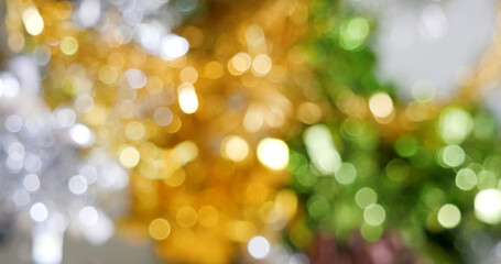 Blurred background golden glitter shiny sparkling banner. Happy Holidays background for template on christmas card brochures posters. Gold bokeh template for digital presentation slideshow background