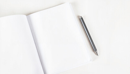 Blank notebook and pen on white background, minimalist workspace