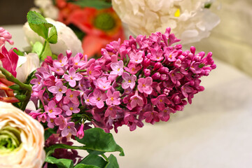 Original flowers made of polymer clay. The most realistic display. Soft focus. Close-up.