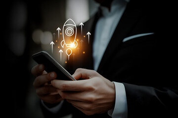 Startup and business boost concept with a businessman holding a smartphone. Successful strategy and launch event with rocket icon and arrows up.	