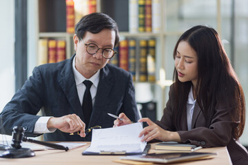 Lawyer or judge consult, Businessman and woman lawyers discussing about contract and agreement concept.
