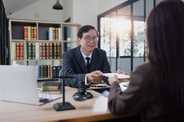 Lawyer or judge consult, Businessman and woman lawyers discussing about contract and agreement concept.