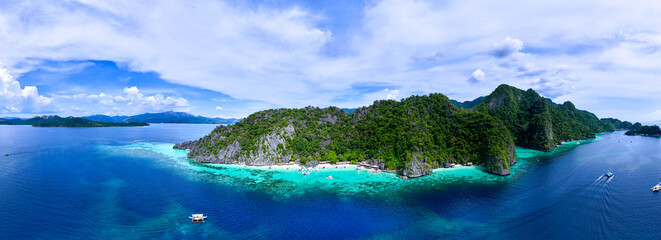 Tropical Island Paradise with Crystal Clear Waters and Lush Greenery