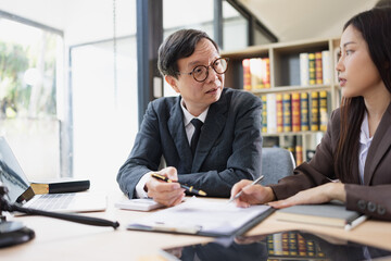 Lawyer or judge consult, Businessman and woman lawyers discussing about contract and agreement concept.