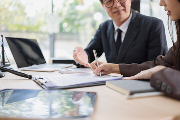 Lawyer or judge consult, Businessman and woman lawyers discussing about contract and agreement concept.