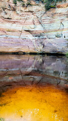 Big Taevaskoda Sandstone cliffs along the Ahja River on the Taevaskoda hiking trail in summer near Põlva, Polwa, Saesaare-Taevaskoja, Estonia