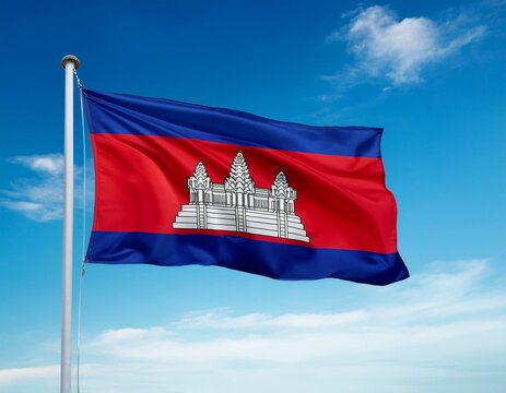 Cambodia flag waving in the wind against a blue sky background