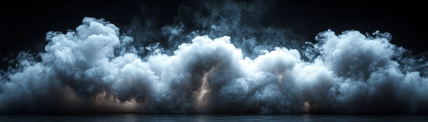 Obraz premium Thick clouds roll across a dark surface, enhancing the dramatic ambience and mystique
