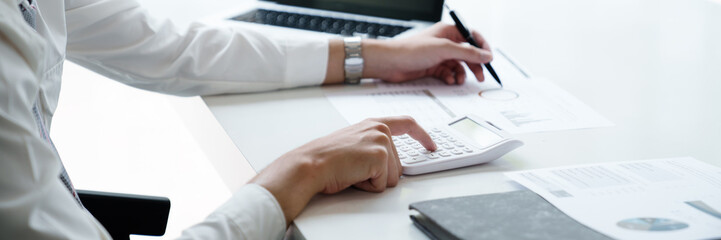 Businessman Analysis Business Accounting working with Individual income tax return Accounting...