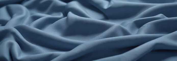 Fototapeta premium Smooth blue cotton fabric with soft woven pattern and gentle sheen , closeup, natural fibers, breathable material