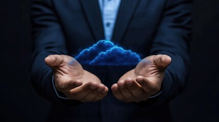 Two hands are positioned forward, displaying a bright blue cloud icon, representing modern technology and innovation. dark background enhances the visual impact of the glowing symbol