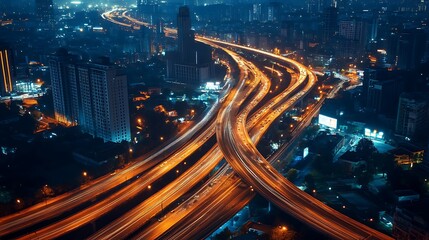 Obraz premium Night City Highway Intersection. Concept of urban infrastructure, transportation, and connectivity.