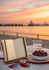 Ramadan Kareem greeting card, invitation mockup, dates and water against the sunset