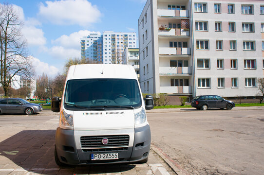 Parked Fiat Ducato by an apartment block area