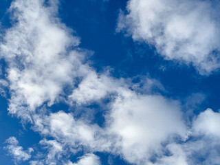 Clear blue skies with clouds
