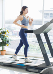 Full body asian young beautiful cheerful happy woman, active sport girl in sportswear exercise...