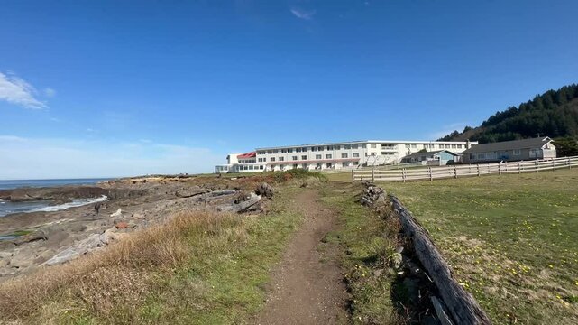Walking to the Overleaf Lodge and Spa, on a beach trail in Yachats Oregon USA.