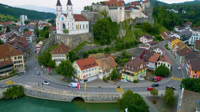 4K Drone Video of the Beautiful Festung Aarburg Castle and Reformierte Kirche Church along the Aare River in Quaint Aarburg, Switzerland
