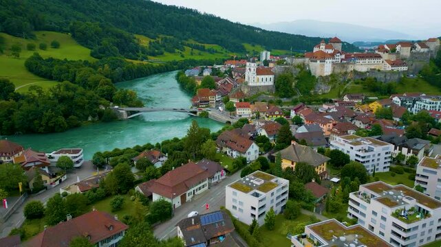 4K Drone Video of the Quaint Homes and Castles along the Aare River in Picturesque Aarburg, Switzerland