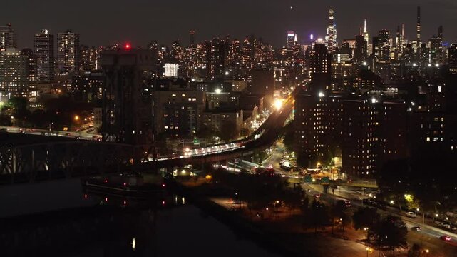 Aerial view of the Metro North Railroad in New York City. Shot at night in 4k.