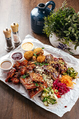 meat plate with vegetables and sauce