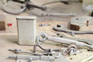 Closeup of dusty vintage bandaid tin with hardware