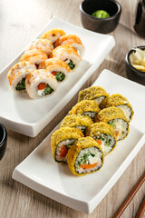 sushi roll with shrimp and baked roll with red fish