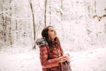 Little girl looking into the sky