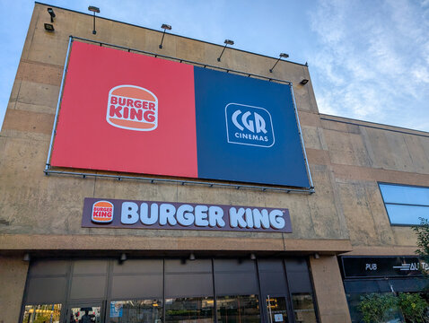 France, 30 November 2024 : Burger King and CGR Cinemas collaborative advertisement on building facade