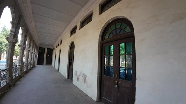 An elegant gallery of the Mubarak Mandi Palace in Jammu