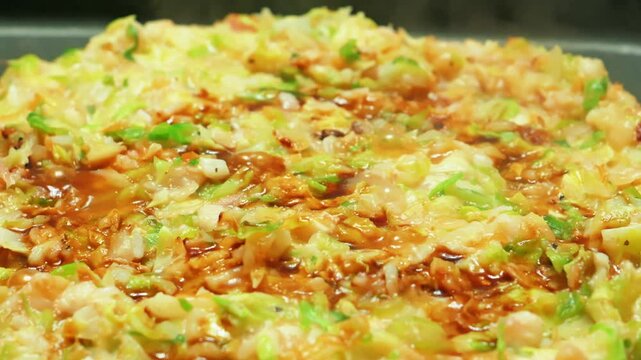 Monjayaki on a hot plate, a Japanese snack similar to okonomiyaki