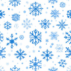 seamless pattern with various blue snowflakes on a white isolated background. winter or Christmas pattern