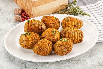 Baked baby potato with thyme