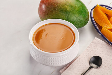 Sweet mango puree in the bowl