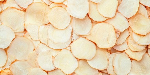 Texture of thinly sliced pickled ginger showing natural color and translucence