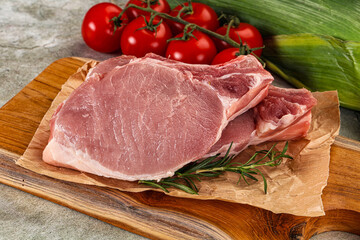 Raw pork steak loin with bone