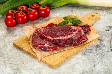 Raw beef cheeks cut for cooking