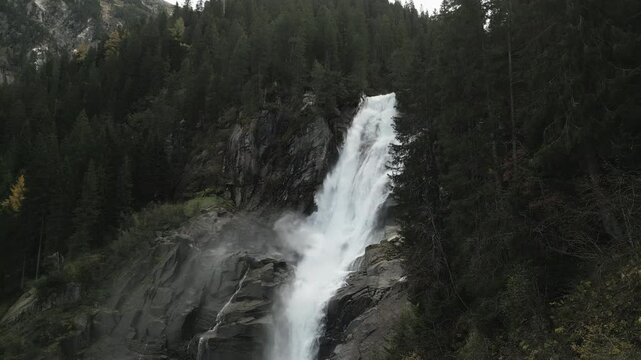 Close-up aerial shot of the Krimml waterfall in Austria - slow motion