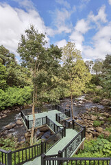 Landscape of waterfall stream on rocks in forest, Thailand